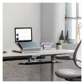 Humanscale L6 Laptop Tray, an adjustable and portable laptop stand that helps improve posture and reduce eye strain.
