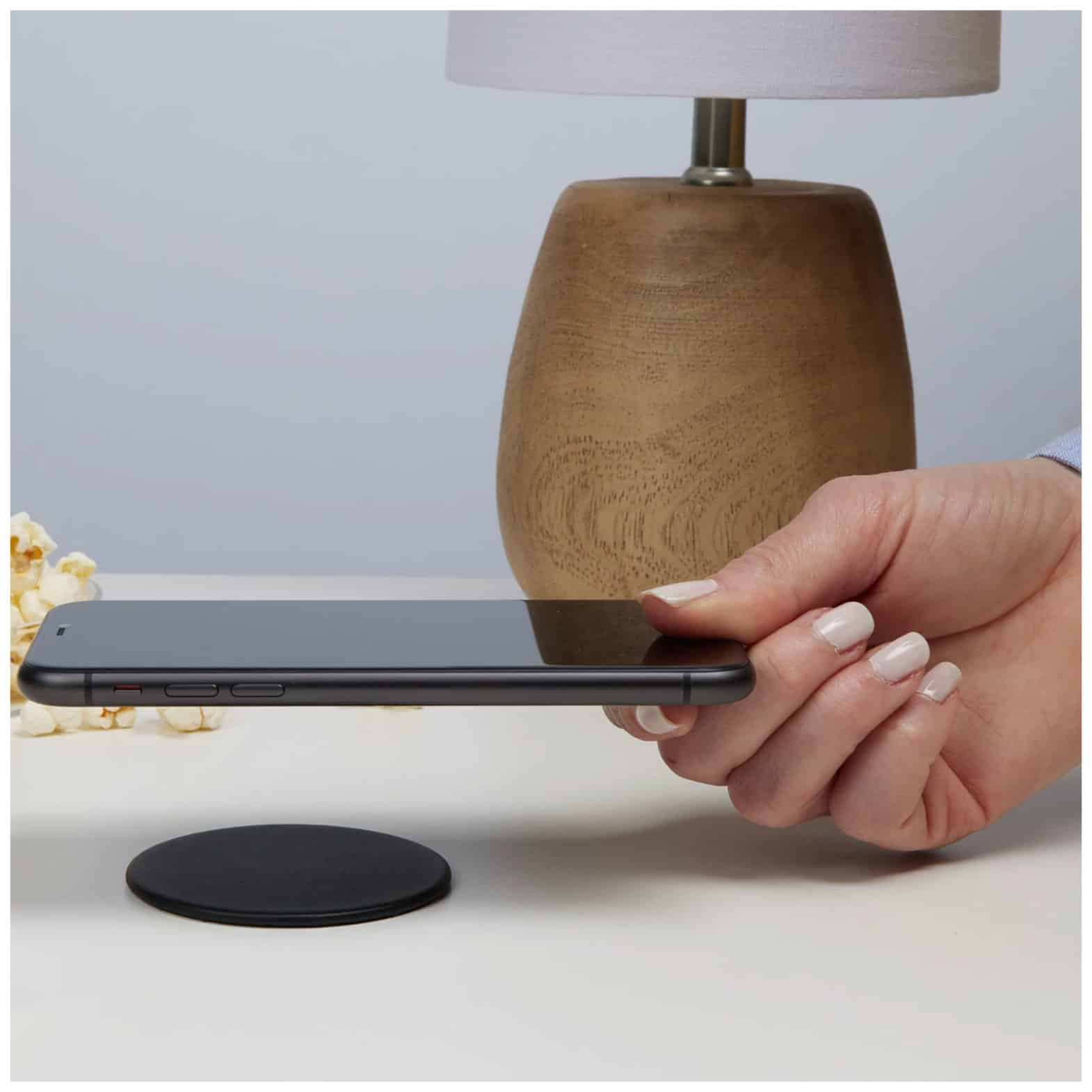 A Qi-compatible wireless charging pad that can charge a variety of devices, including smartphones, tablets, and smartwatches